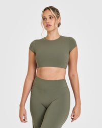 SoftMotion™ Short Sleeve Crop Top with White Logo | Alpine Green