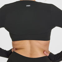 SoftMotion™ Long Sleeve Shrug with White Logo | Soft Black