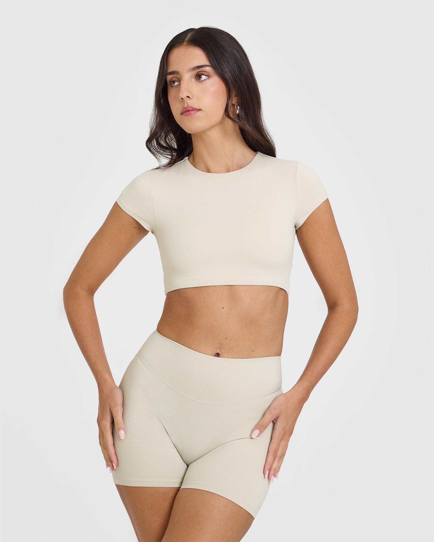SoftMotion™ Short Sleeve Crop Top with White Logo | Sand