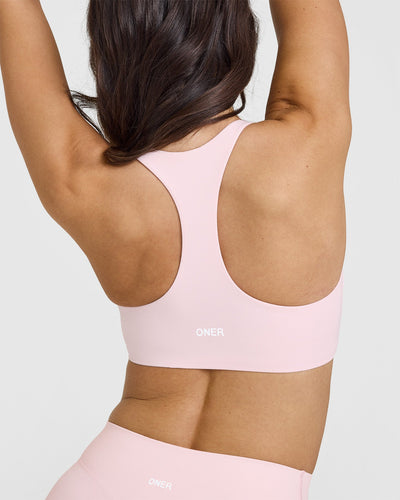 SoftMotion™ Sports Bra with White Logo | Ballet Pink