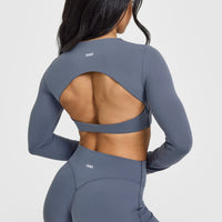 SoftMotion™ Long Sleeve Crop Top with White Logo | Granite Blue