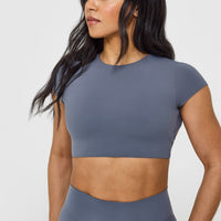 SoftMotion™ Short Sleeve Crop Top with White Logo | Granite Blue
