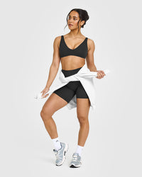 SoftMotion™ Scoop Back Bralette with White Logo | Soft Black