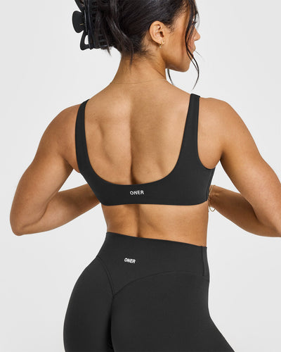 SoftMotion™ Scoop Back Bralette with White Logo | Soft Black