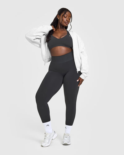 Effortless Seamless Racer Back Sports Bra with White Logo | Coal