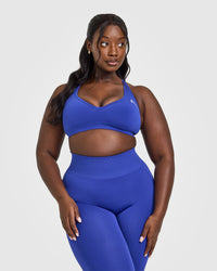 Effortless Seamless Racer Back Sports Bra with White Logo | Space Blue