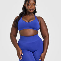 Effortless Seamless Racer Back Sports Bra with White Logo | Space Blue