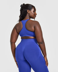Effortless Seamless Racer Back Sports Bra with White Logo | Space Blue