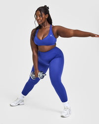 Effortless Seamless Racer Back Sports Bra with White Logo | Space Blue