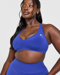 Effortless Seamless Racer Back Sports Bra with White Logo | Space Blue