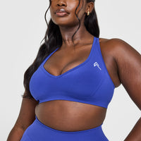 Effortless Seamless Racer Back Sports Bra with White Logo | Space Blue