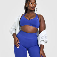Effortless Seamless Racer Back Sports Bra with White Logo | Space Blue