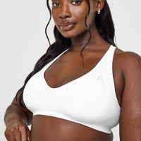 Effortless Seamless Racer Back Sports Bra with White Logo | White