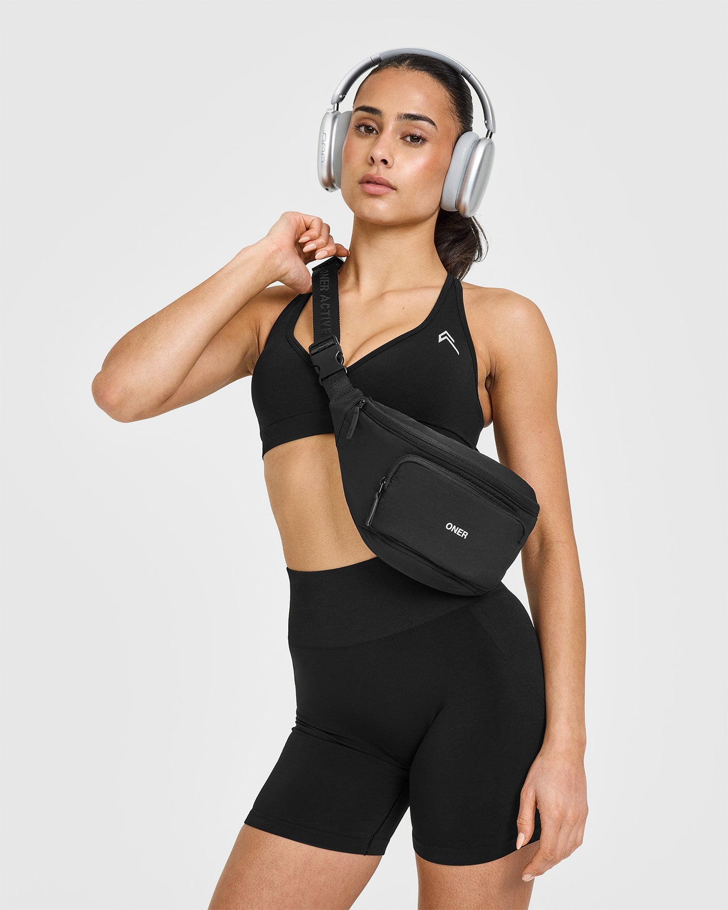 Effortless Seamless Racer Back Sports Bra with White Logo | Black