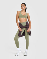 Effortless Seamless Racer Back Sports Bra with White Logo | Deep Sage Green