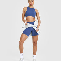 EasyLift™ High Neck Sports Bra with White Logo | Shadow Blue