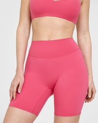 SoftMotion™ Cycling Shorts 8" with White Logo | Dark Velvet Pink