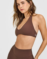 SoftMotion™ Minimal Halter Neck Bralette with White Logo | Espresso Brown