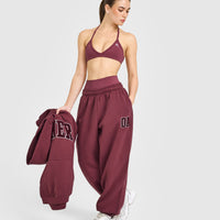 EnhanceLift™ Seamless Minimal Halter Neck Bralette with White Logo | Burnt Maroon
