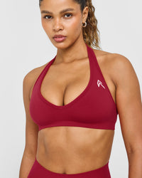 Effortless Seamless Halter Neck Sports Bra with White Logo | Claret Red