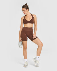 Effortless Seamless Halter Neck Sports Bra with White Logo | Rustic Brown