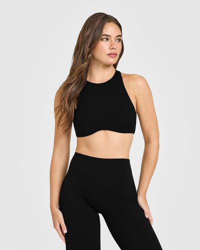 SoftMotion™ High Neck Sports Bra with White Logo | Black