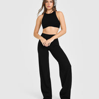 SoftMotion™ High Neck Sports Bra with White Logo | Black