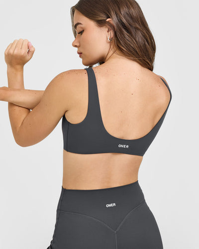 SoftMotion™ Scoop Back Bralette with White Logo | Coal