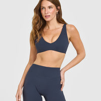 SoftMotion™ Scoop Back Bralette with White Logo | True Blue