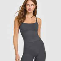 SoftMotion™ Strappy Mid Vest with Built in Bra Shelf with White Logo | Coal