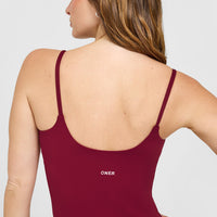 SoftMotion™ Strappy Vest with Built in Bra Shelf with White Logo | Ruby Red