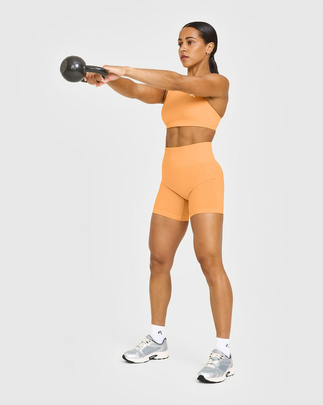 Effortless Seamless Shorts with White Logo | Powdered Orange