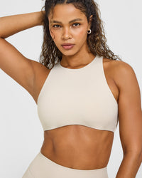 SoftMotion™ High Neck Sports Bra with White Logo | Sand