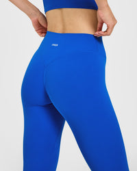 SoftMotion™ High Waisted Leggings with White Logo | Light Cobalt Blue