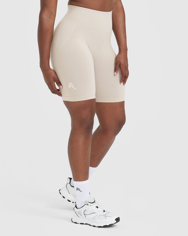 Effortless Seamless Cycling Shorts with White Logo | Sand