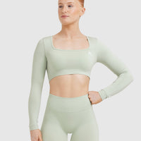 Effortless Square Neck Crop Long Sleeve Top with White Logo | Tea Green