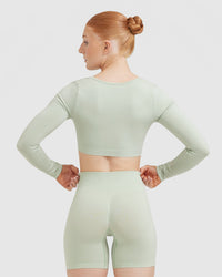 Effortless Square Neck Crop Long Sleeve Top with White Logo | Tea Green