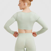 Effortless Square Neck Crop Long Sleeve Top with White Logo | Tea Green