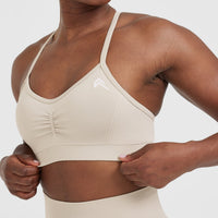Effortless Strappy Bralette with White Logo | Sand