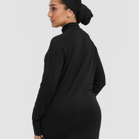 Go To Seamless Loose Long Sleeve Longline Top | Black
