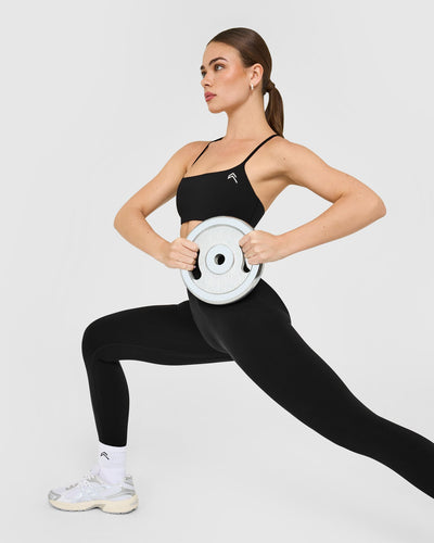 EasyLift™ Strappy Sports Bra with White Logo | Black