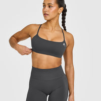 EasyLift™ Strappy Sports Bra with White Logo | Coal