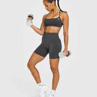 EasyLift™ Strappy Sports Bra with White Logo | Coal