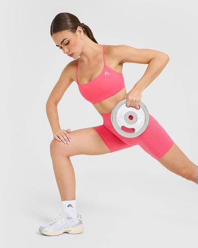 EasyLift™ Strappy Sports Bra with White Logo | Hot Girl Pink