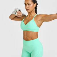 EnhanceLift™ Seamless Strappy Sports Bra with White Logo | Peppermint Green
