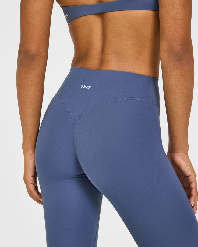 SoftMotion™ High Waisted Leggings with White Logo | Slate Blue