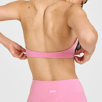 SoftMotion™ Minimal Halter Neck Bralette with White Logo | Rose Pink