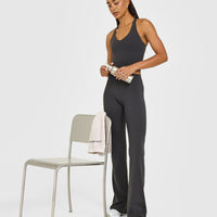 SoftMotion™ Racer Back Mid Vest with Built in Bra Shelf with White Logo | Coal