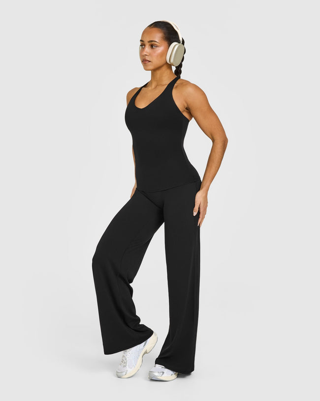 SoftMotion™ Racer Back Vest with Built in Bra Shelf with White Logo | Black