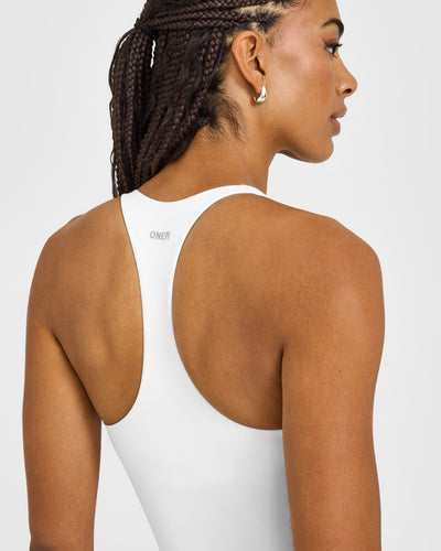 SoftMotion™ Racer Back Mid Vest With Built in Bra Shelf | White
